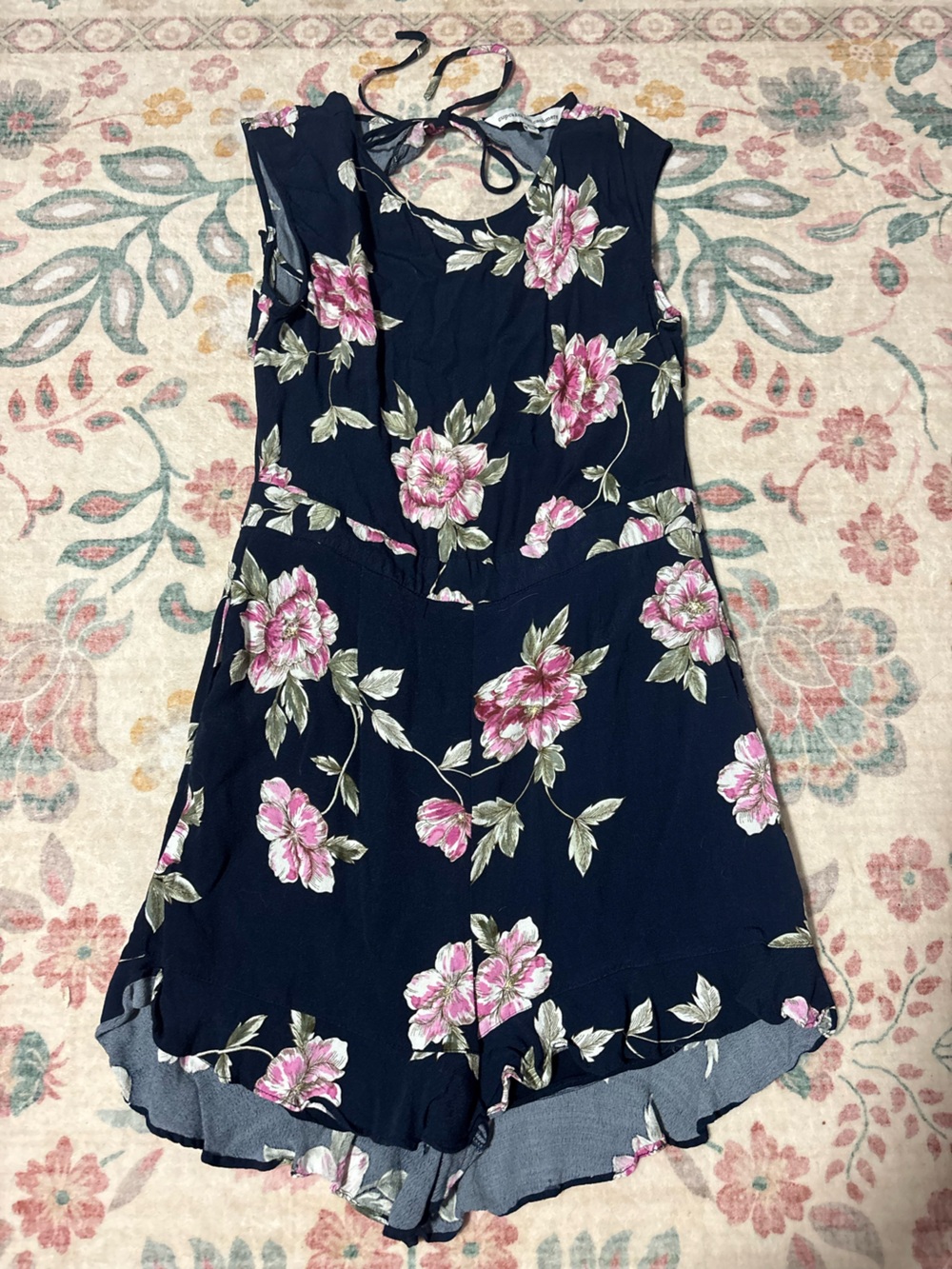 cupcakes & cashmere Navy Floral Halter Romper with Pink Blossoms
